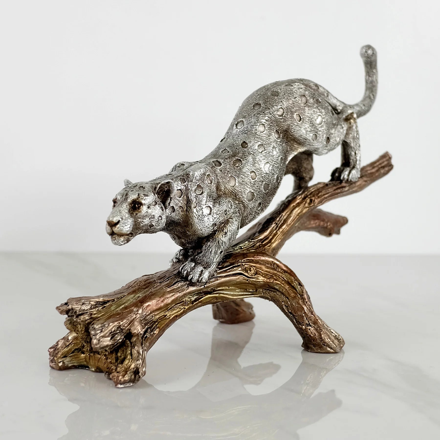 SILVER LEOPARD ON TREE EL 16-652