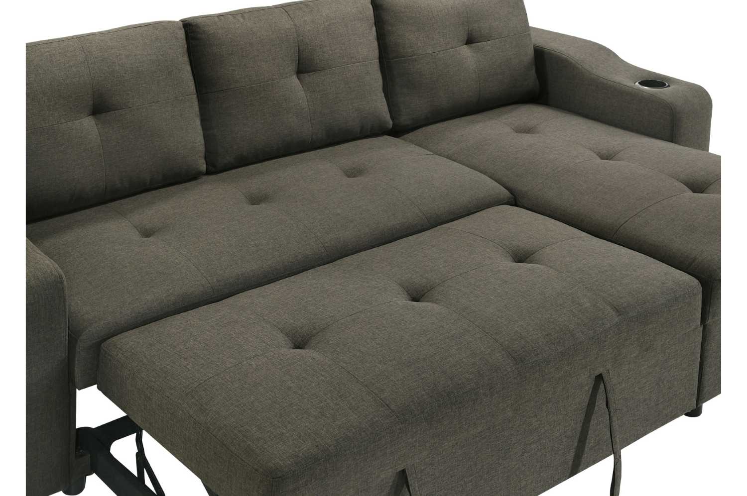 Gray sectional sofa with tufted cushions on a white background