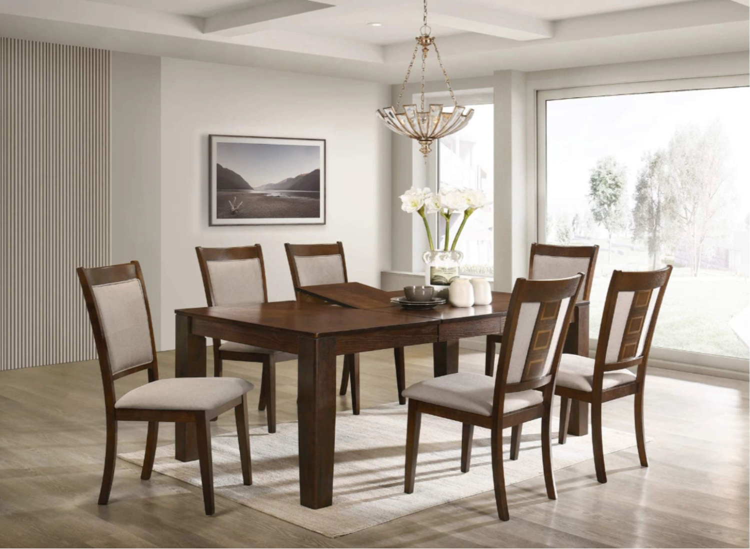 Dining room with wooden table and chairs in a well-lit room.