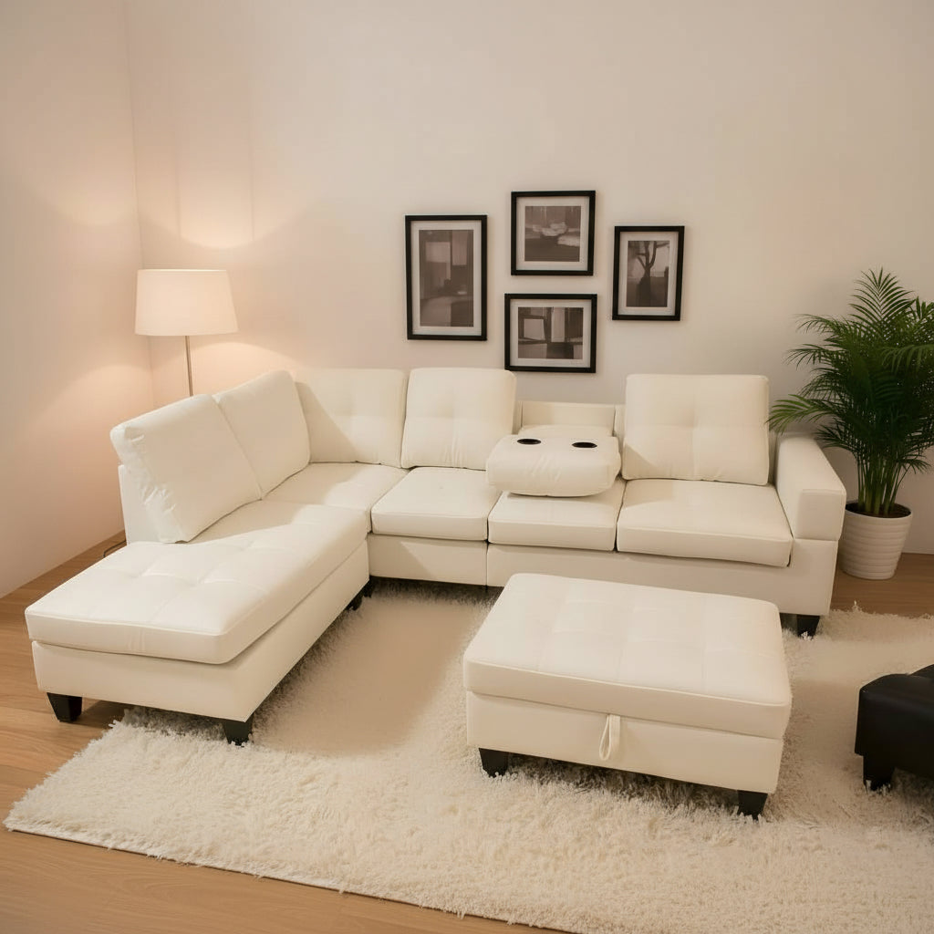 White sectional sofa with ottoman in a living room setting