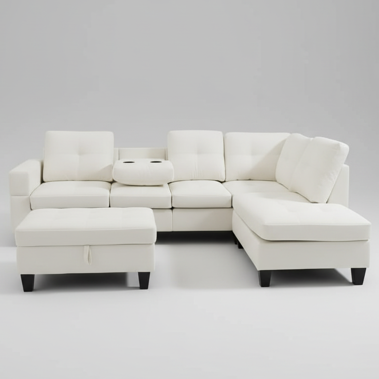 White sectional sofa with ottoman on a gray background