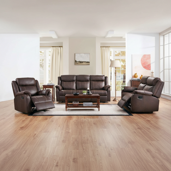 Brown leather recliner sofa set in a living room with wooden floor and large windows.