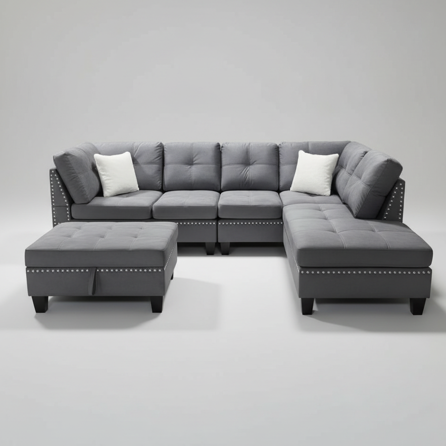 Gray sectional sofa with ottoman on a gray background