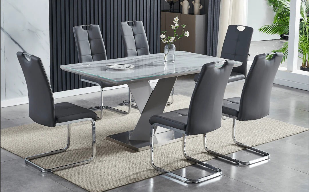 Dining table set with six modern chairs in a room with decor elements.