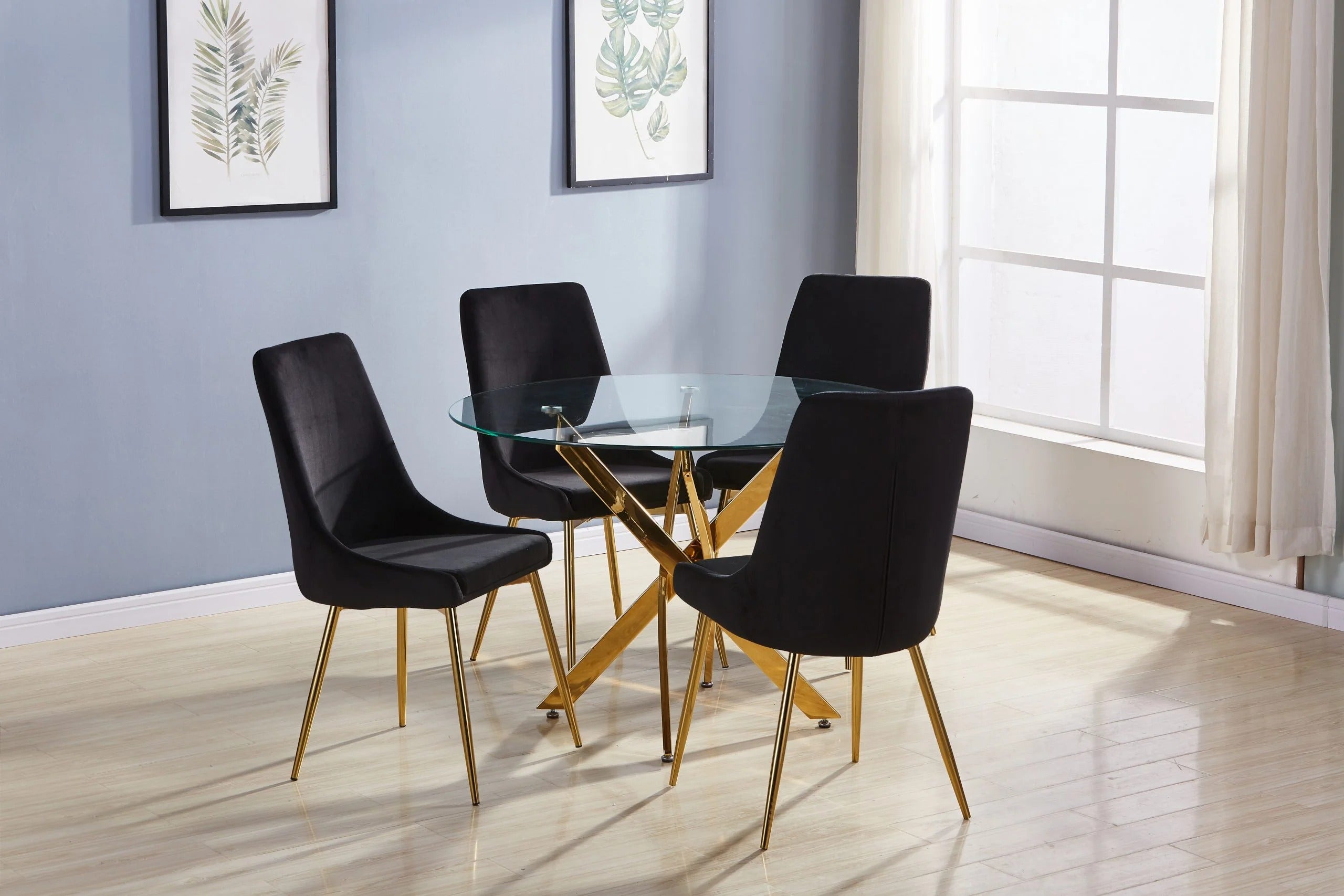 Round Gold Leg Dining Table with 4 Black Chairs